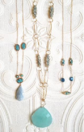 Michelle Pressler Jewelry uses semi-precious stones, silk cord, sterling silver, 14k gold-filled, quartz, pearls, garnet, turquoise, topaz, zircon, amethyst, opals, gold-filled chain links.